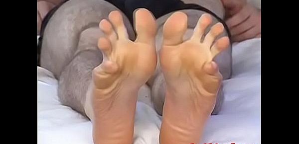  Sexy businessman showing off his perfect toes